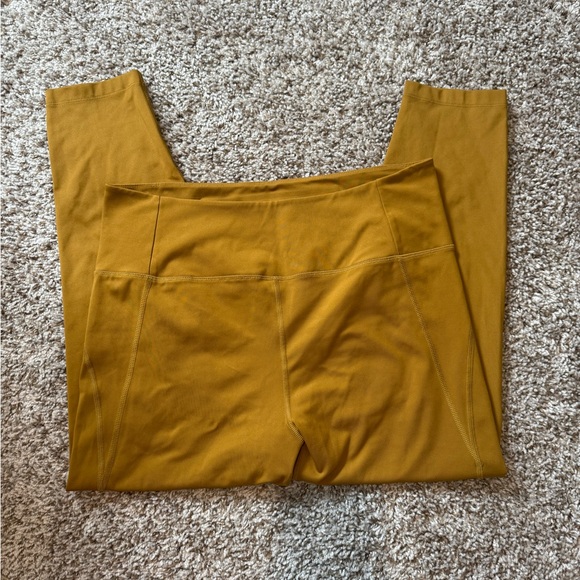 Girlfriend Collective High Waist Capri Saddle Leggings Mustard - Picture 2 of 5